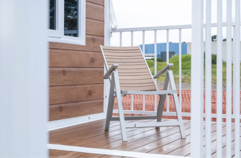 Decking and balustrade system fitted to an expandable container home